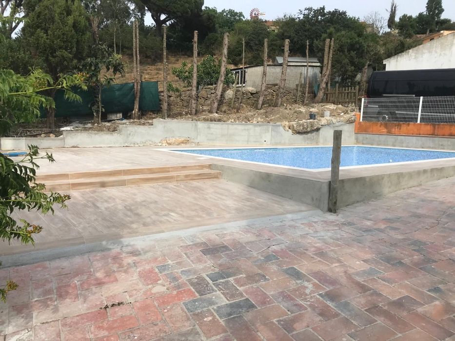 Construção de piscinas64739243764355126
