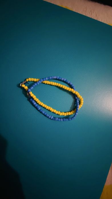 Brasoletka 20,5 cm z koralikow zolta z niebieska Ukraina