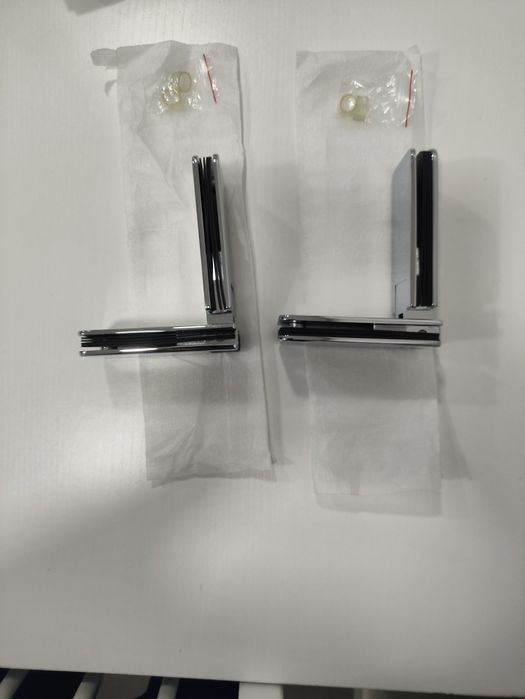 Par de dobradiças para portas de duche de batente 180°.