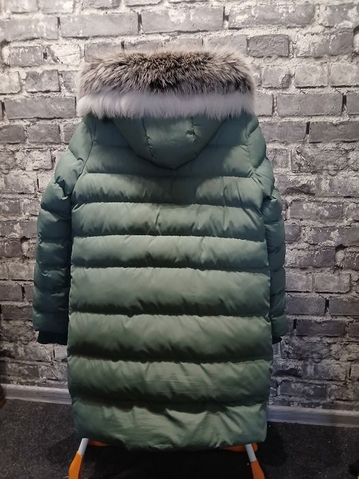 Продам новый пуховик 48р.