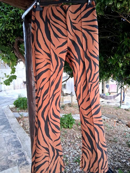 Calça Breskha,com casaco Zara.