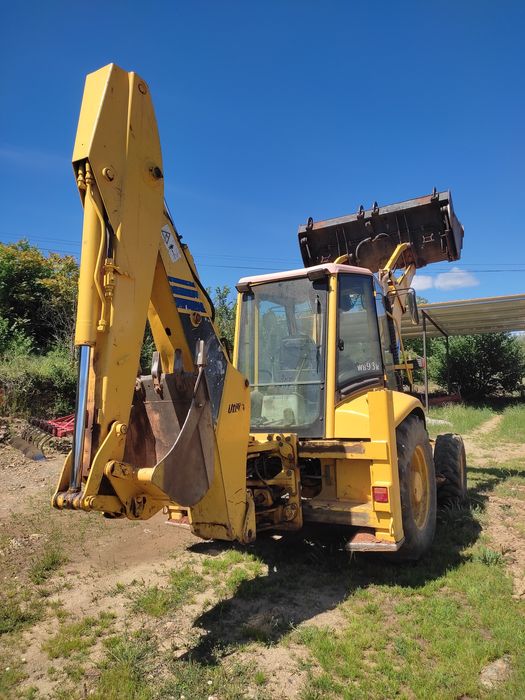 Retro- Escavadora Komatsu WB93R