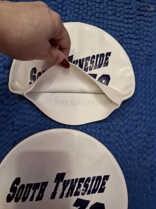 Шапочки для плавання