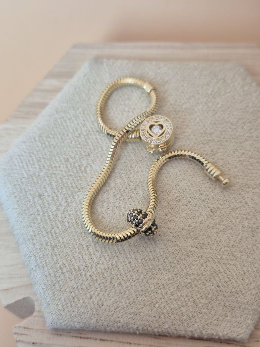 Złoty charms Stoper malutki z czarnymi cyrkoniami okrągły 585