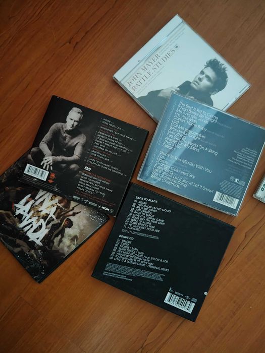 Cd's Sting, Coldplay, John Mayer
