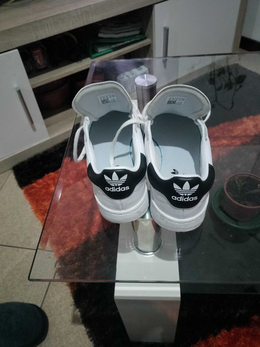 Sapatilhas Nike e Fila