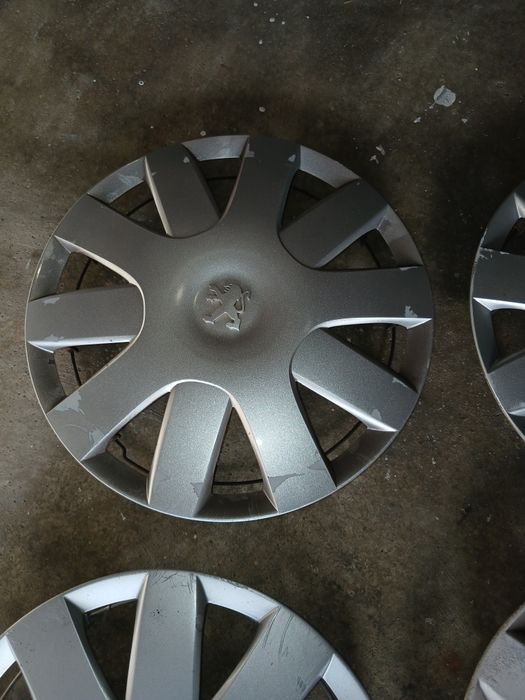 Tampões Peugeot originais roda 14 usados..