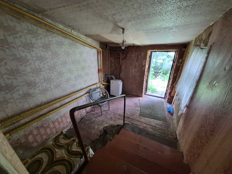 Продам 1\2 частина будинку м. Зміїв