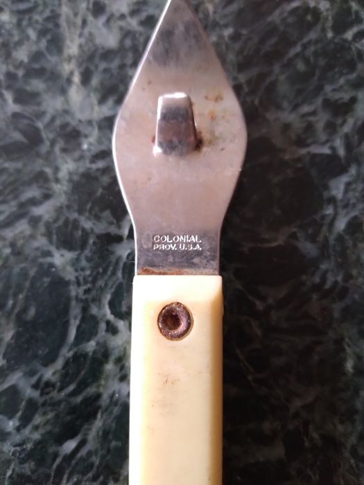 Stary otwieracz do butelek