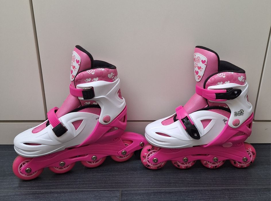 Patins em linha rosa