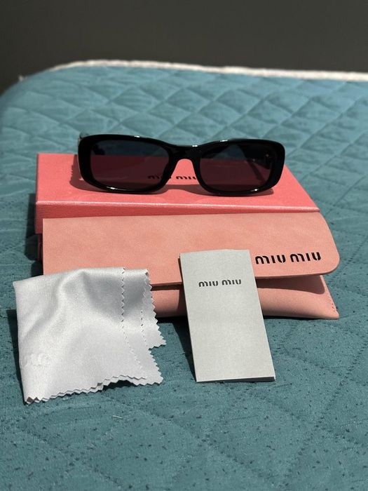 Oculos de sol com caixa