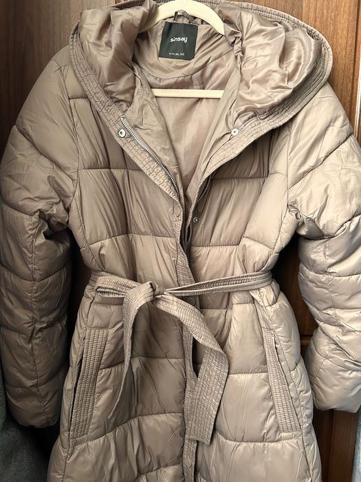 Пуховик новий бежевий какао 42 XL