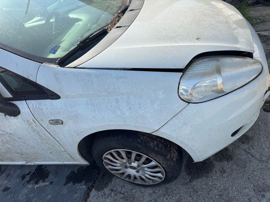 Fiat grande punto  249 biały białe drzwi prawe lewe maska pas przedni lampa lampy przednie tylnie prawa lewa zderzak przód przedni sanki kołyska zderzak tył tylni  pas przedni z chłodnicami