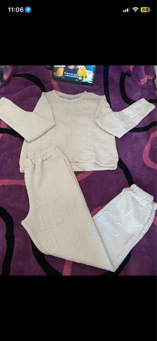 Conjunto de calças e camisola