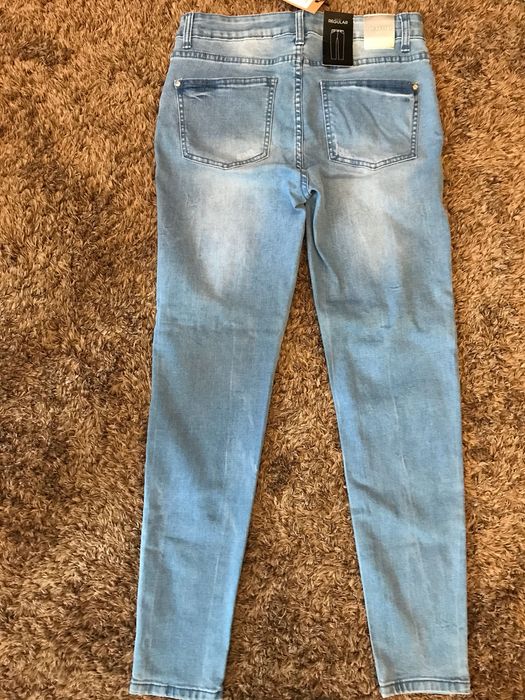 Spodnie jeansy regular 38 nowe