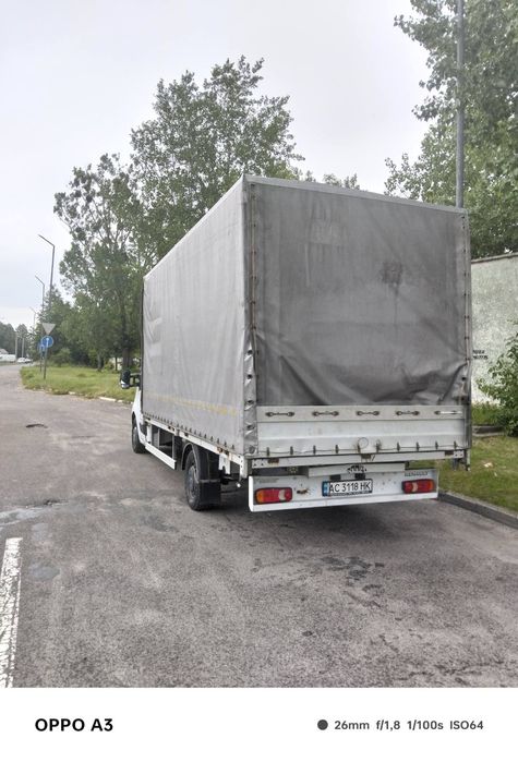 Доставка перевезення вантажу пландеком