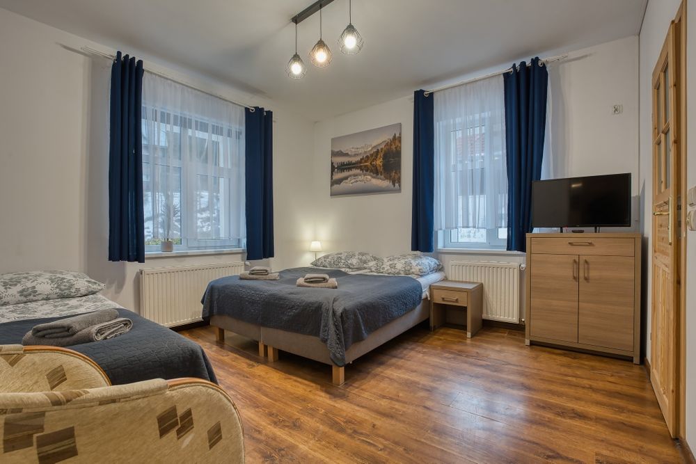 Tanie pokoje w centrum, balia, parking, ogólnodostępna kuchnia.