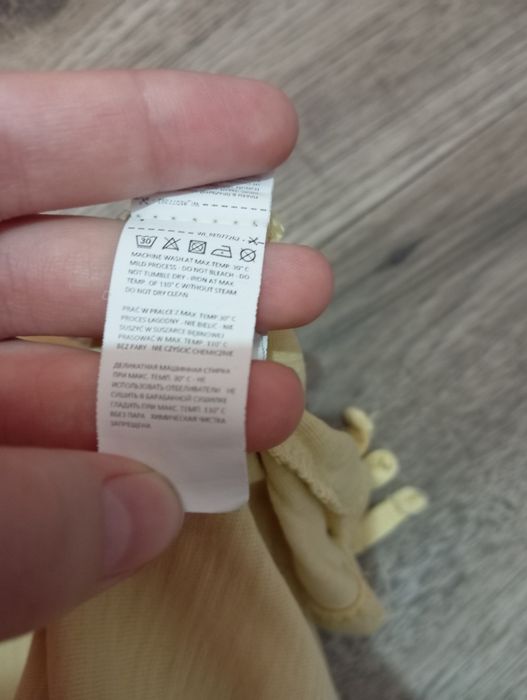 Żółta bluzka z cytrynką na piersi rozmiar 146 z reserved