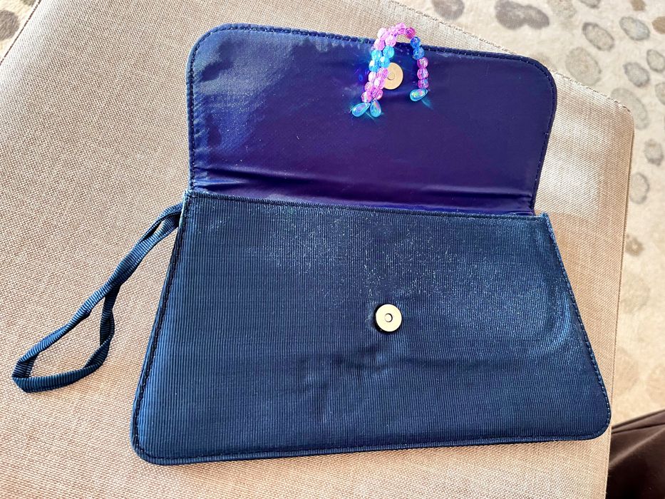 Mala clutch AVON nova