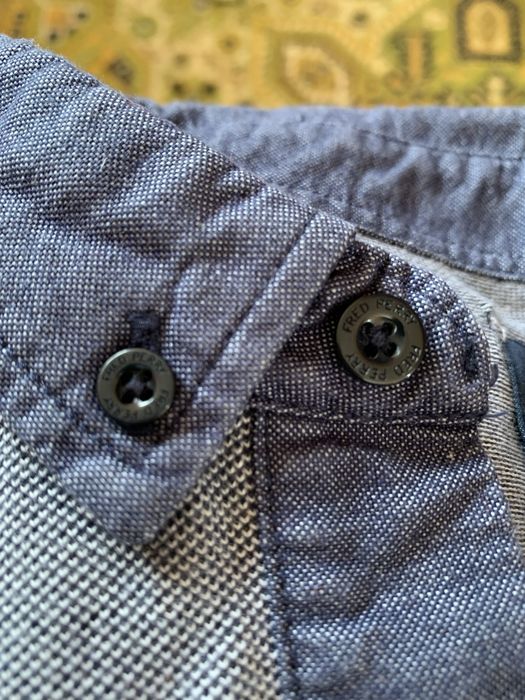 поло Fred Perry.