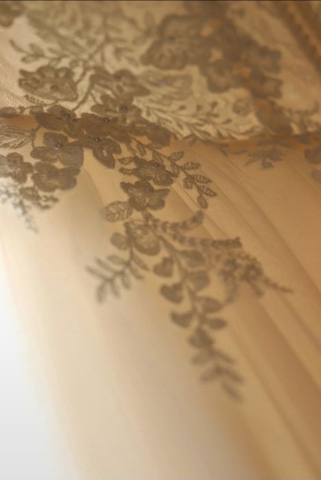 Kremowa Suknia ślubna