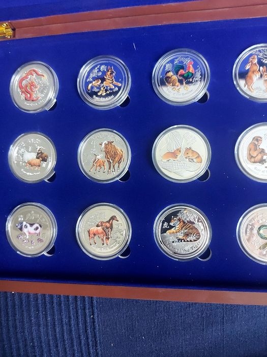 Набір монет серії "Східний календар"в дерев'яному футлярі 1$ Австралія