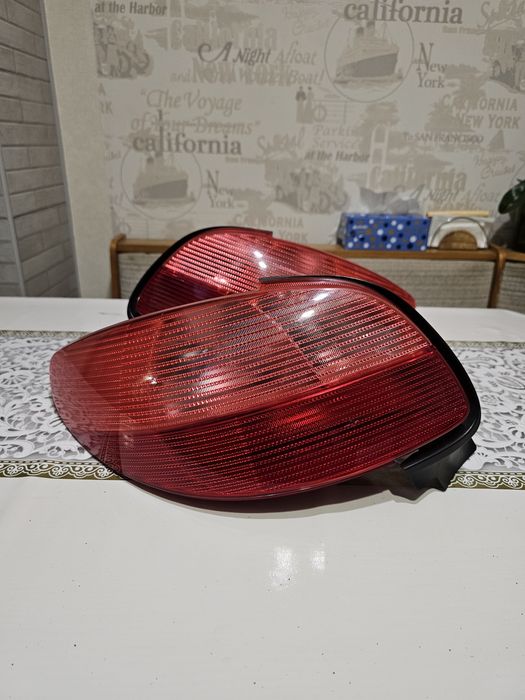 Задні фари Peugeot 206 дорестайлінг та рестайлінг