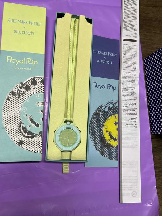 Swatch AP SSX03L101N - Jasnoniebieski bezel, limonkowe akcenty