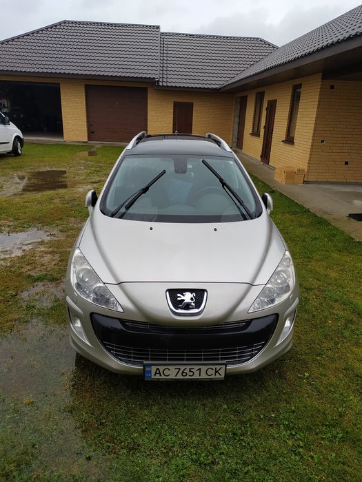 Peugeot 308 SW T7 2009 рік