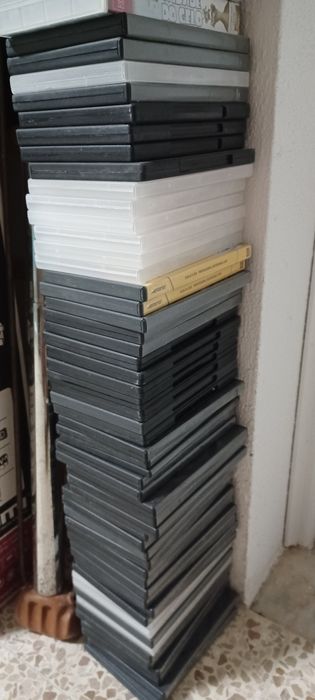 54 caixas arquvo cds/dvds .Estão novas