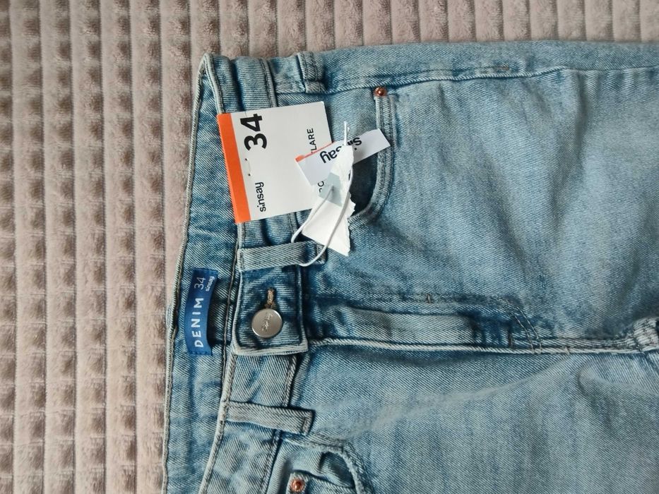 Spodnie jeansowe firmy Sinsay r.34