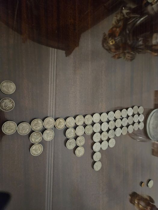Moedas de 5 escudos dos anos entre 1963 e 1985