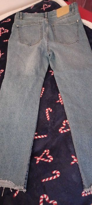 Calças de ganga a boca de sino