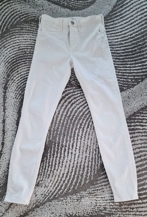 Spodnie jeans "River Island".