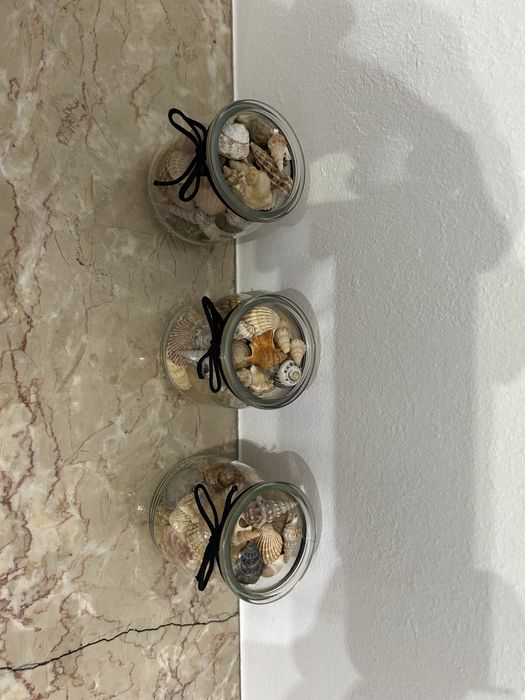 Vendo copinhos de decoracao com motivos do mar.