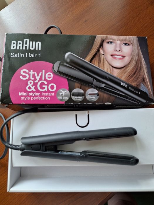 Продаю дорожный утюжок фирмы  BRAUN