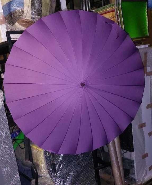 Парасолі тростини