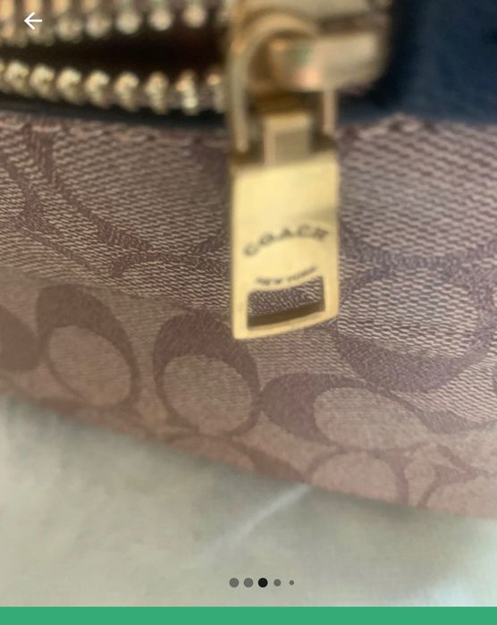Mochila Coach castanha