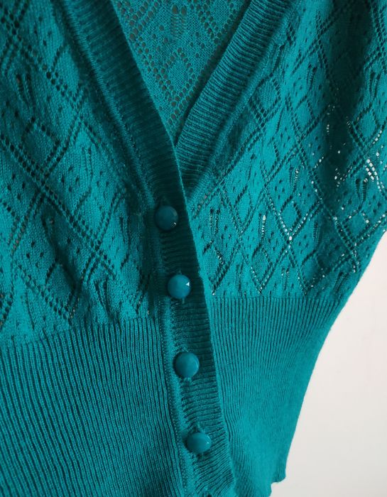 Casaco malha azul turquesa e top alças