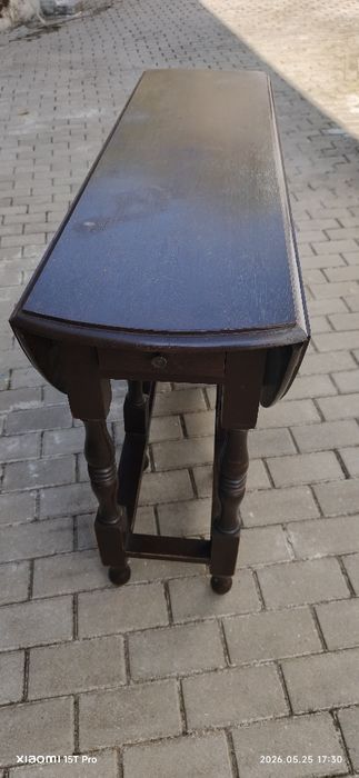 Mesa redonda de jantar com abas