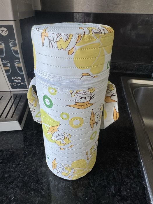 Aquecedor de biberao com oferta de copos doseadores