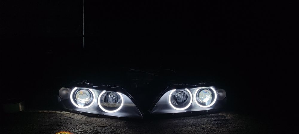BMW E39 Lampy BiLED BLACK NOWE Hella Regeneracja Ringi Mocne światło!