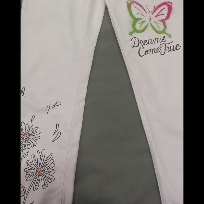 Джинси р.34/XS з гарненьким літнім принтом