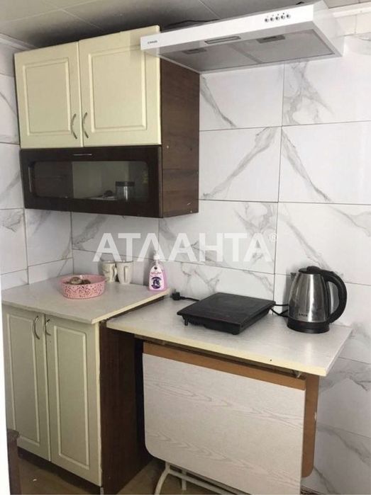 Продам двухуровневую комнату  в центре