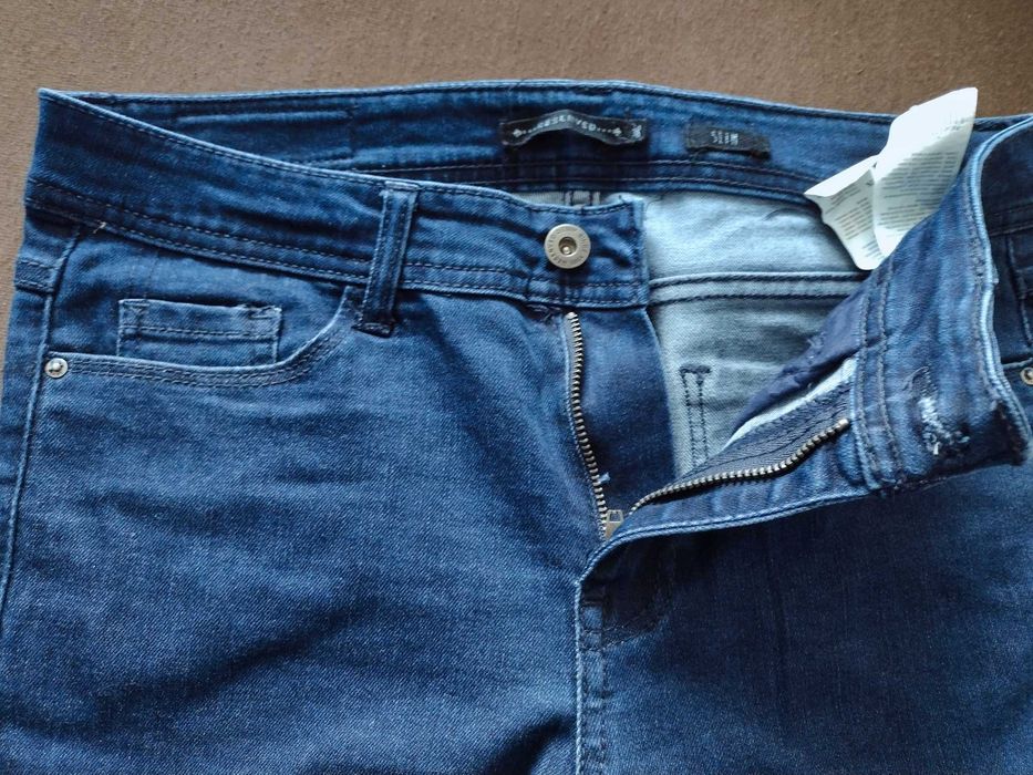 Spodnie jeansowe RESERVED damskie r. 38 - jak nowe