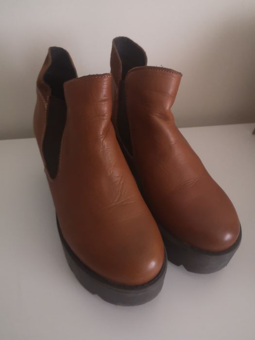 Botas de inverno em pele