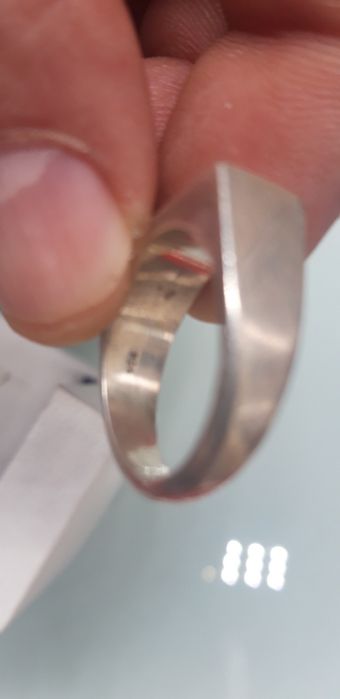 2 aneis de prata 925 ler discrição.