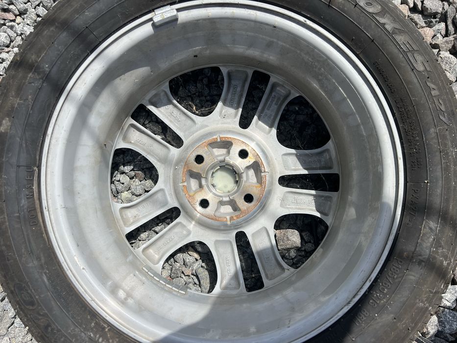 Продам диск на Мазду 2-3 R16 розмір з літнєю резиною