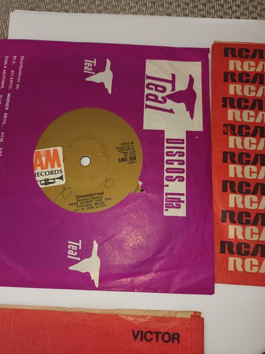 10 discos vinil 45 , muito antigos