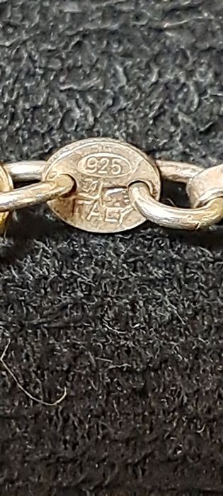 Fio cordão em prata dourada.